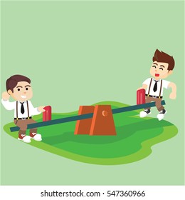 boy students playing seesaw together