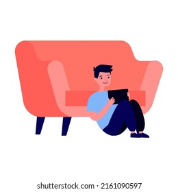 Boy suffering from social media addiction. Parent and child sitting together at home and using digital devices