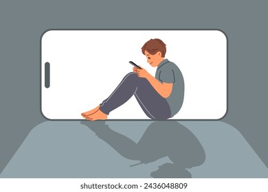 Boy suffers from digital addiction and uncontrollably uses mobile phone to chat on social networks. Child with cyber addiction dreams of becoming blogger so can work through phone.