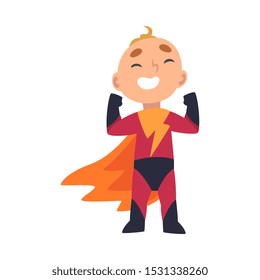 Boy in a superhero costume rejoices holding his fists up cartoon vector illustration