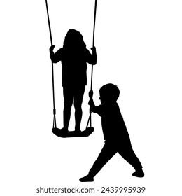 Boy swinging a girl. Silhouettes of kids playing outdoor