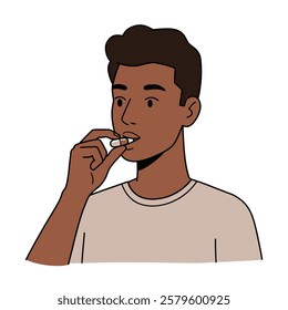  A boy taking a probiotic capsule on a white background