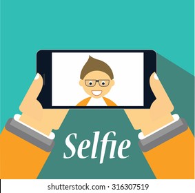 Boy taking a selfie on his smurtphone