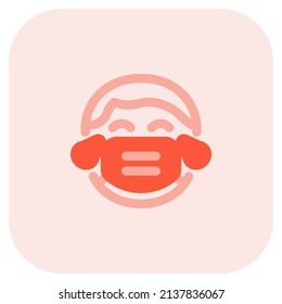 Boy with tears of joy facial expression wearing the mask to avoid diseases