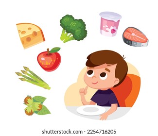 Boy thinking, considering healthy eco food sitting at the table. Child choosing meal for breakfast, lunch. Boy choose what to eat for supper, dinner or snack. Hungry kid have a meal.