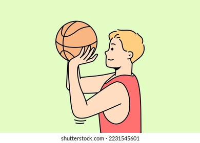 Boy throws ball into hoop or through net. Guy playing basketball or volleyball on court. Basketballer, hoopster, player trying to hit into rim. Sportsman practices drills. Young man training.