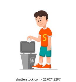 a boy throws paper in the trash