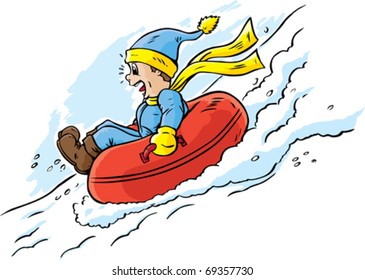 Boy tubing down a hill and having a great time