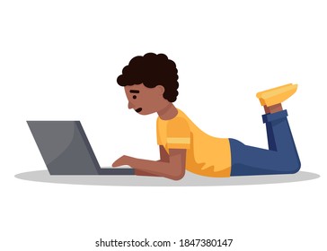 The boy uses a laptop. Online learning or homeschooling.