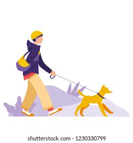 A boy walk with his dog in cold weather, boy walk his dog in autumn/winter season, happy dog and boy walk together