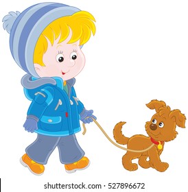 Boy walking with his dog