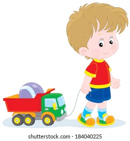 Boy walking with toys