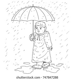 The boy walks through the umbrella of a rainy day.