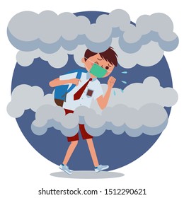 A boy walks while coughing from a smoke disaster. Indonesian Elementary School students wear breathing masks.