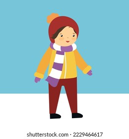 boy in warm clothes walking in winter