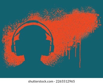 A boy wearing headphones as he plays a video game is seen silhouetted against a wall spattered with spray paint in the vector image.