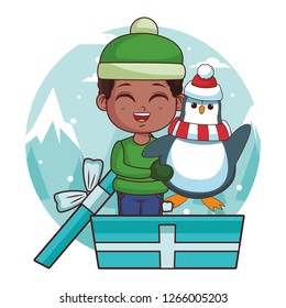 Boy with winter clothes and penguin inside gift box cartoon