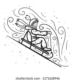 The boy in the winter rides on a sleigh down the hill
