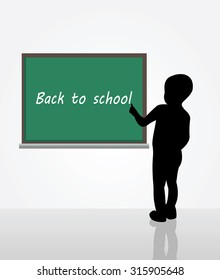 boy writing on a chalkboard: Back to school