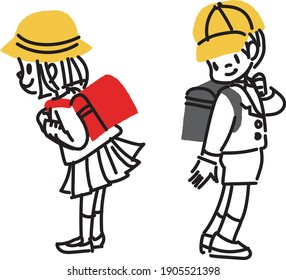 Boys and girls carrying school bags in the first grade of elementary school