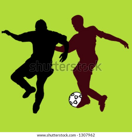 boys kicking soccerball