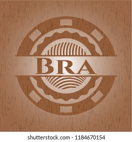 Bra badge with wood background