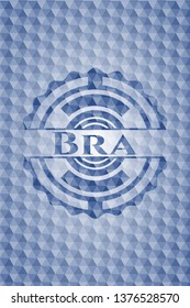 Bra blue badge with geometric pattern background.