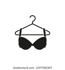 Bra is on hanger icon. Vector. Flat design.