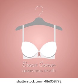 Bra with pink ribbon to help promote Breast cancer awareness.