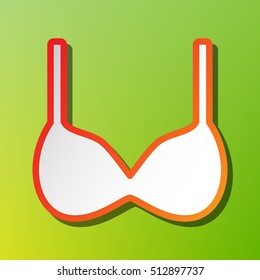 Bra simple sign. Contrast icon with reddish stroke on green backgound.