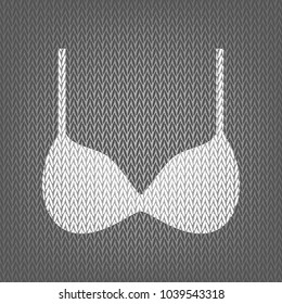 Bra simple sign. Vector. White knitted icon on gray knitted background. Isolated.