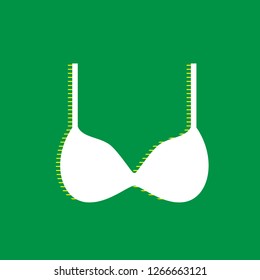 Bra simple sign. Vector. White flat icon with yellow striped shadow at green background.