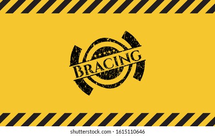 Bracing black grunge emblem with yellow background. Vector Illustration. Detailed.
