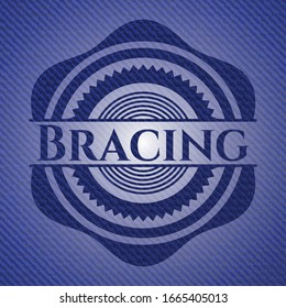 Bracing emblem with denim texture. Vector Illustration. Detailed.