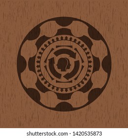 brain storm icon inside badge with wood background