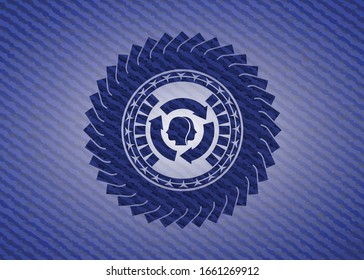 brain storm icon inside badge with denim background