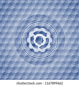 brain storm icon inside blue emblem or badge with abstract geometric polygonal pattern background.