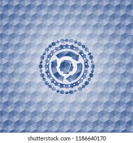 brain storm icon inside blue badge with geometric background.