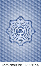 brain storm icon inside blue emblem with geometric pattern.