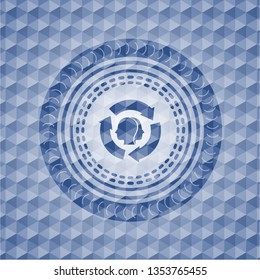 brain storm icon inside blue emblem or badge with abstract geometric pattern background.