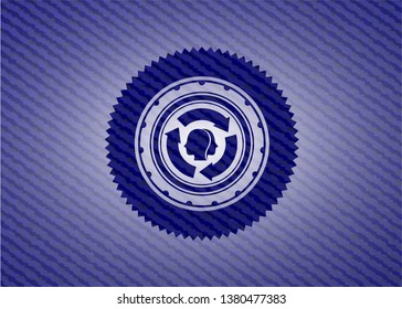brain storm icon inside emblem with denim texture