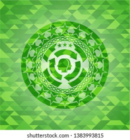 brain storm icon inside green emblem with mosaic ecological style background