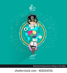 Brainstorming businessman sitting on the table