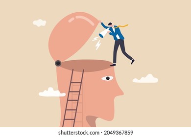 Brainwash, make someone to believe, aggressive or repetitive advertising message, awareness, motivation or communication concept, furious businessman shouting on megaphone with loud voice to open head