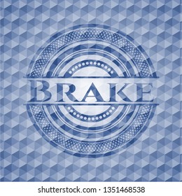 Brake blue emblem with geometric pattern background.