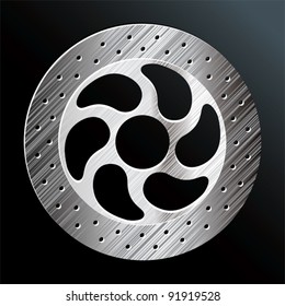 Brake disc on black background.