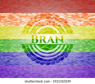 Bran on mosaic background with the colors of the LGBT flag. 