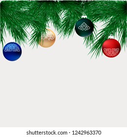 branches of a christmas tree with ornaments