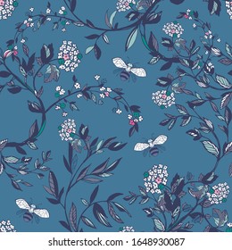 Branches of flowering trees vector illustration. Seamless pattern with bees, twigs, leaves and flowers on a blue background.