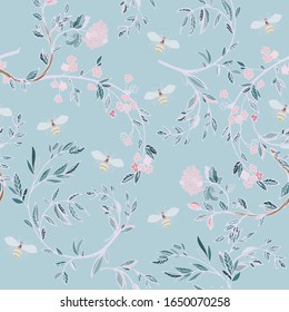 Branches of flowering trees vector illustration. Seamless pattern with bees, twigs, leaves and flowers on a light blue background.